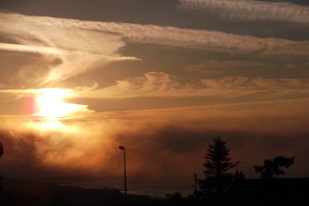 coucher de soleil et brume de mer